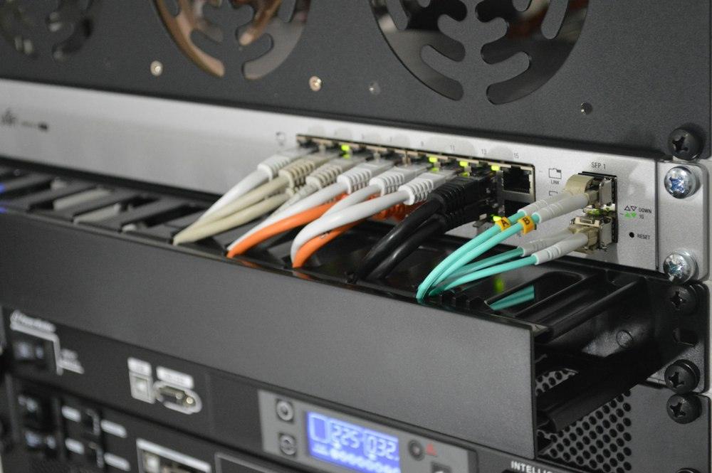 Fibre cables connected to a network switch